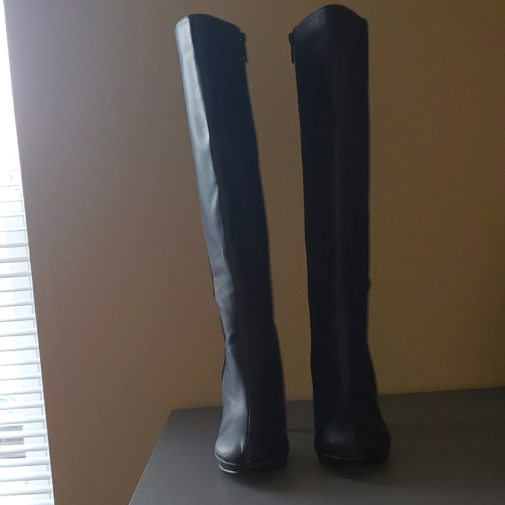 black thigh knee high heeled boots